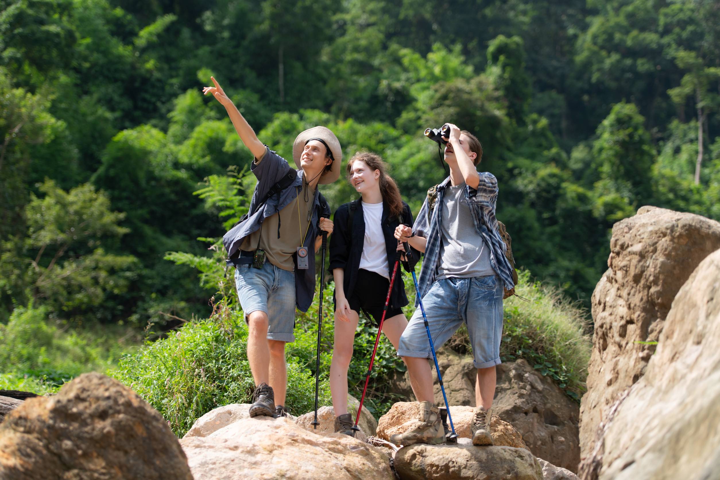 Tourists Hiking Mountain Trail